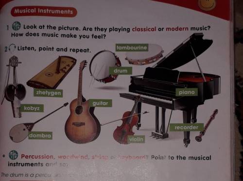 1 Look at the picture. Are they playing classical or modern music? How does music make you feel?2. L